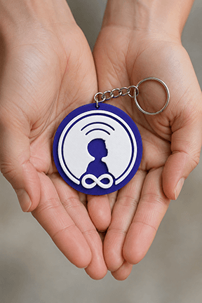 An Indigo KinTag held in two hands